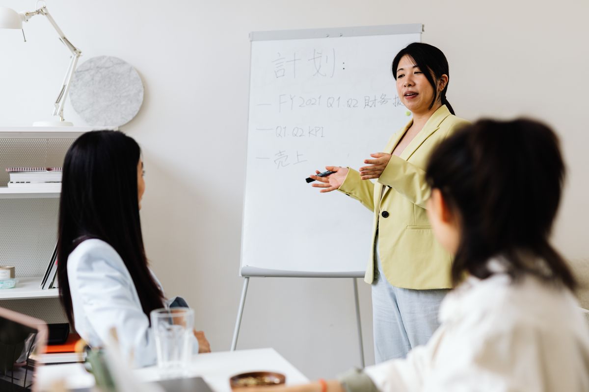 A facilitator leading a small-group development session